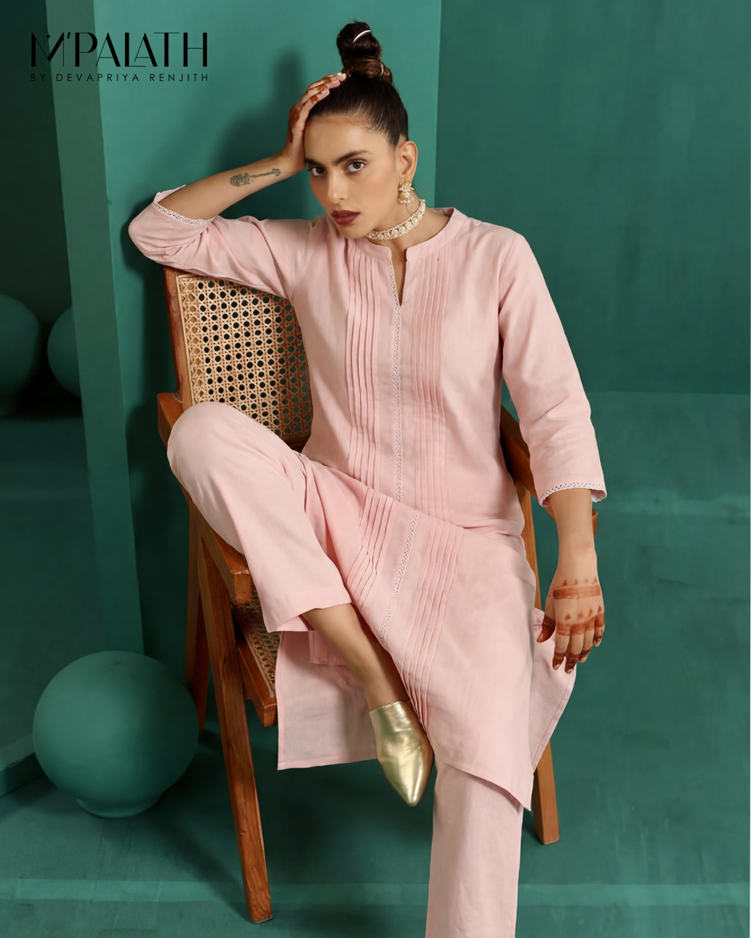 M'PALATH pink cotton kurta set with pearl choker on seated model